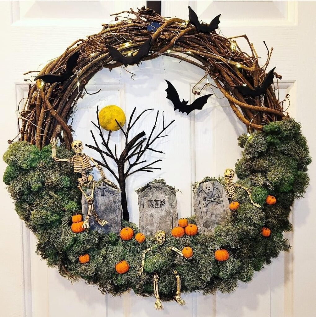 Spooky wreath with graveyard scene and bats