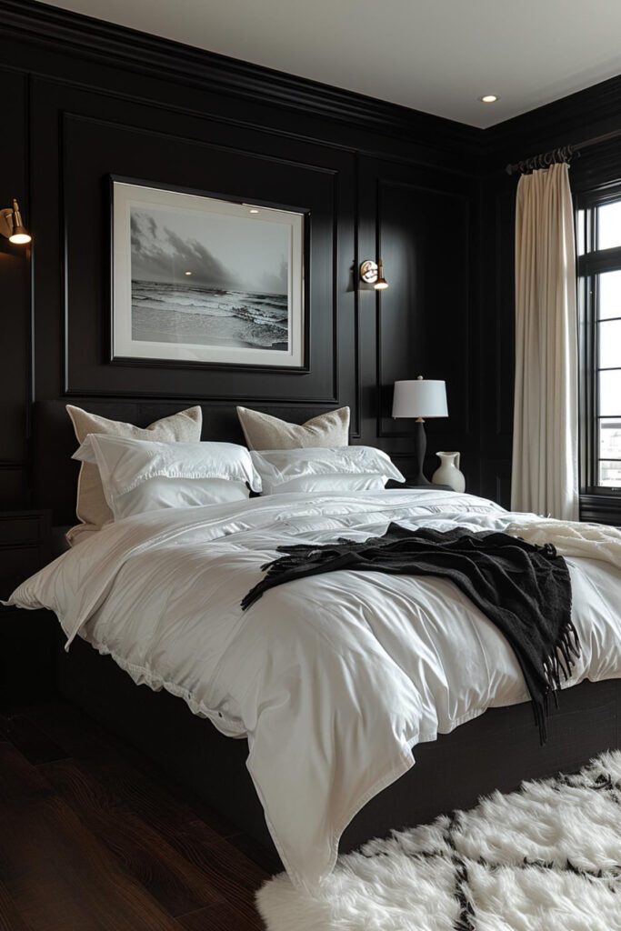 Black bedroom with white bedding and beach photograph