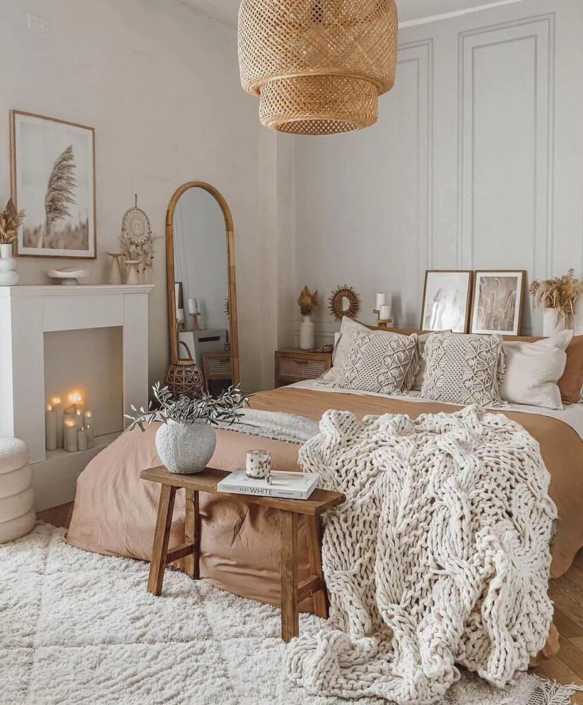 Cozy bedroom with neutral colors chunky knit throw and natural textures