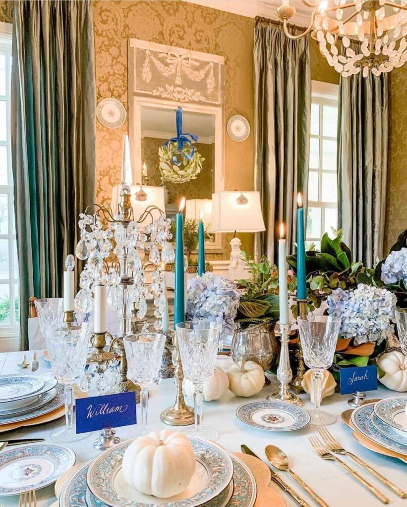 Elegant Thanksgiving table with blue hydrangeas crystal and gold decor