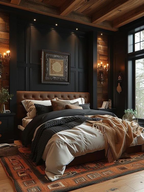 Dark rustic bedroom with tufted headboard and candle sconces