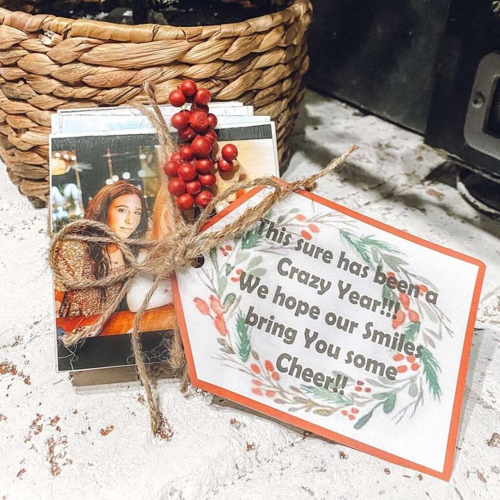 Handmade holiday card with photo and red berries