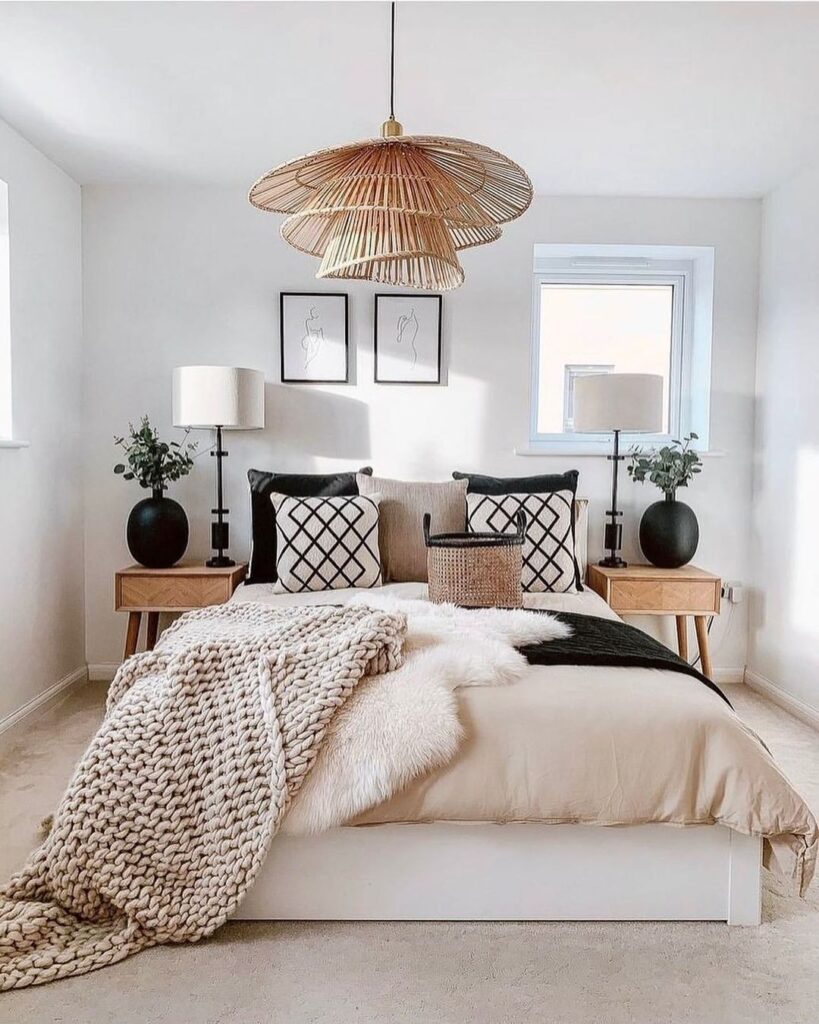 Neutral bedroom with boho accents and rattan light