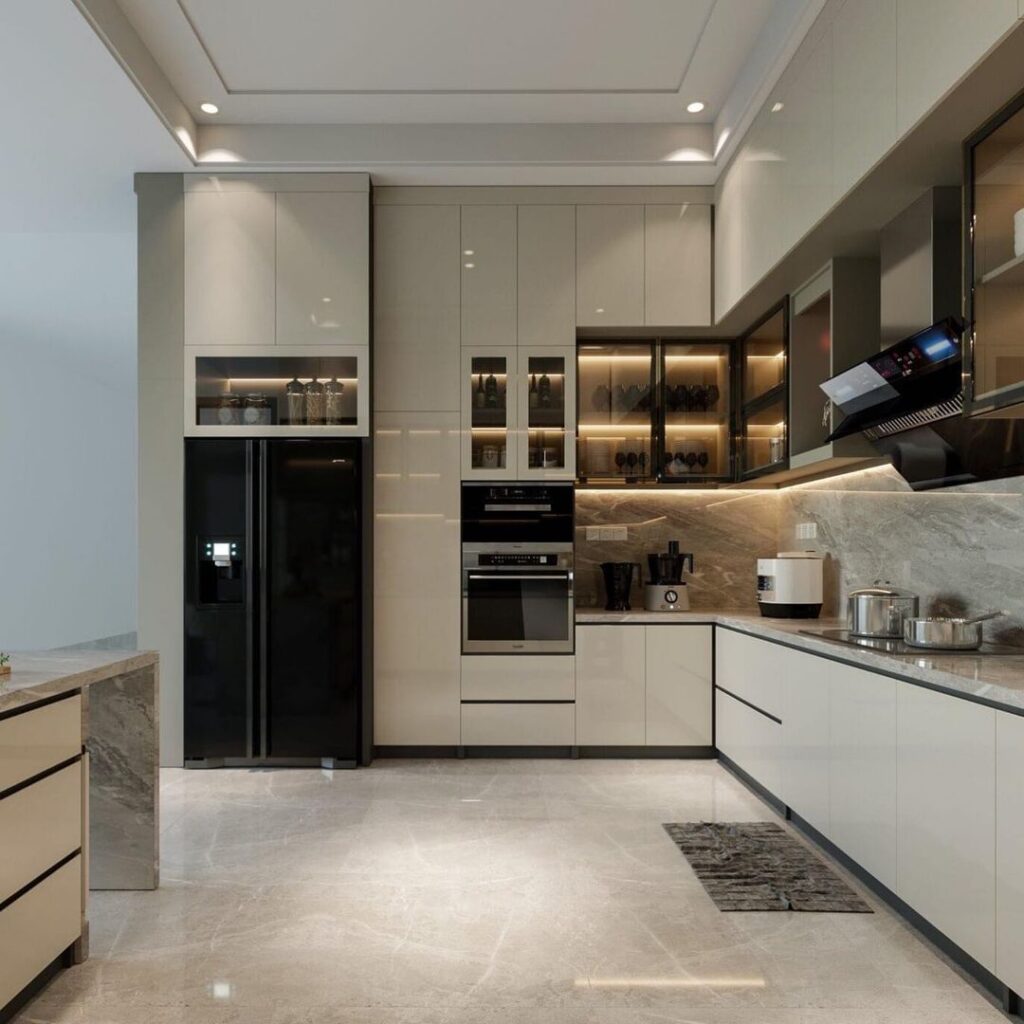 Modern beige kitchen with glossy cabinets, marble surfaces, and ambient lighting.