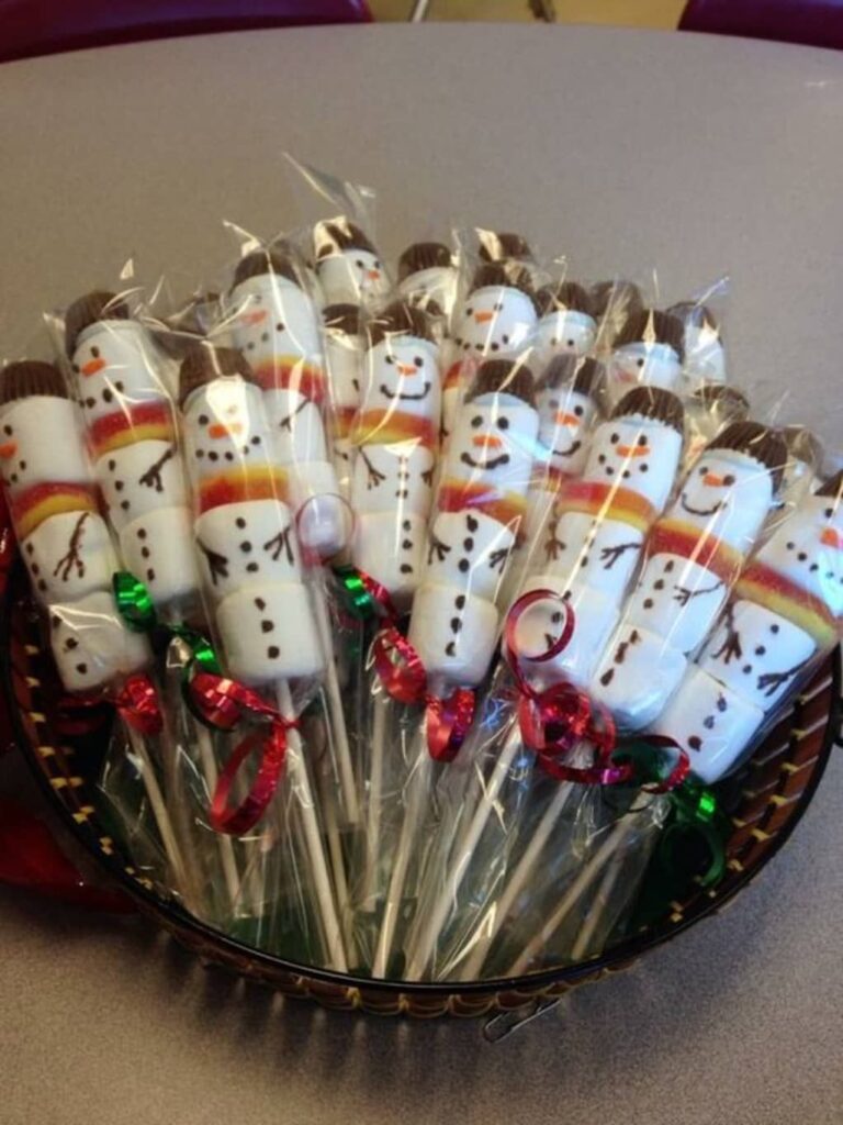 Cheese sticks decorated as snowmen