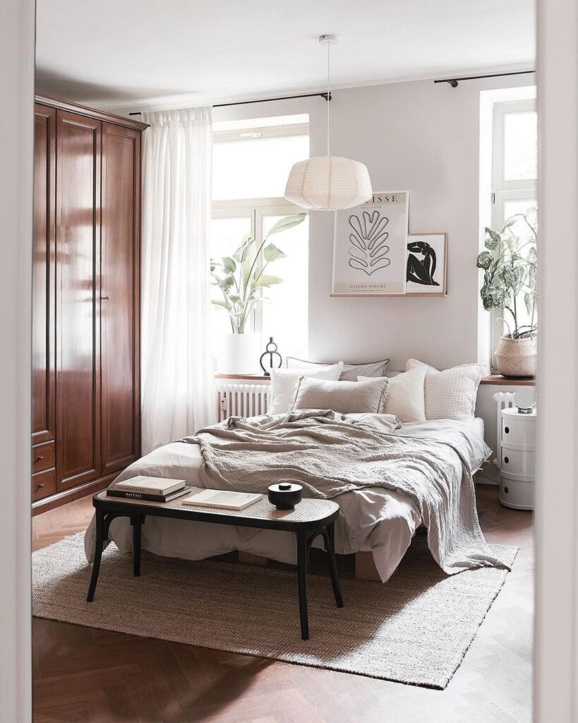 Bright minimalist bedroom with wooden accents