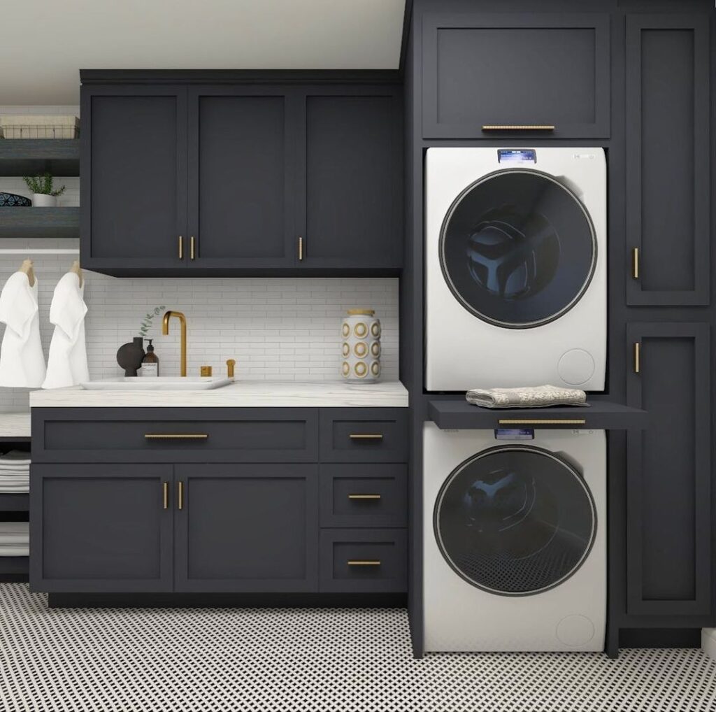 Modern dark gray laundry room with gold accents