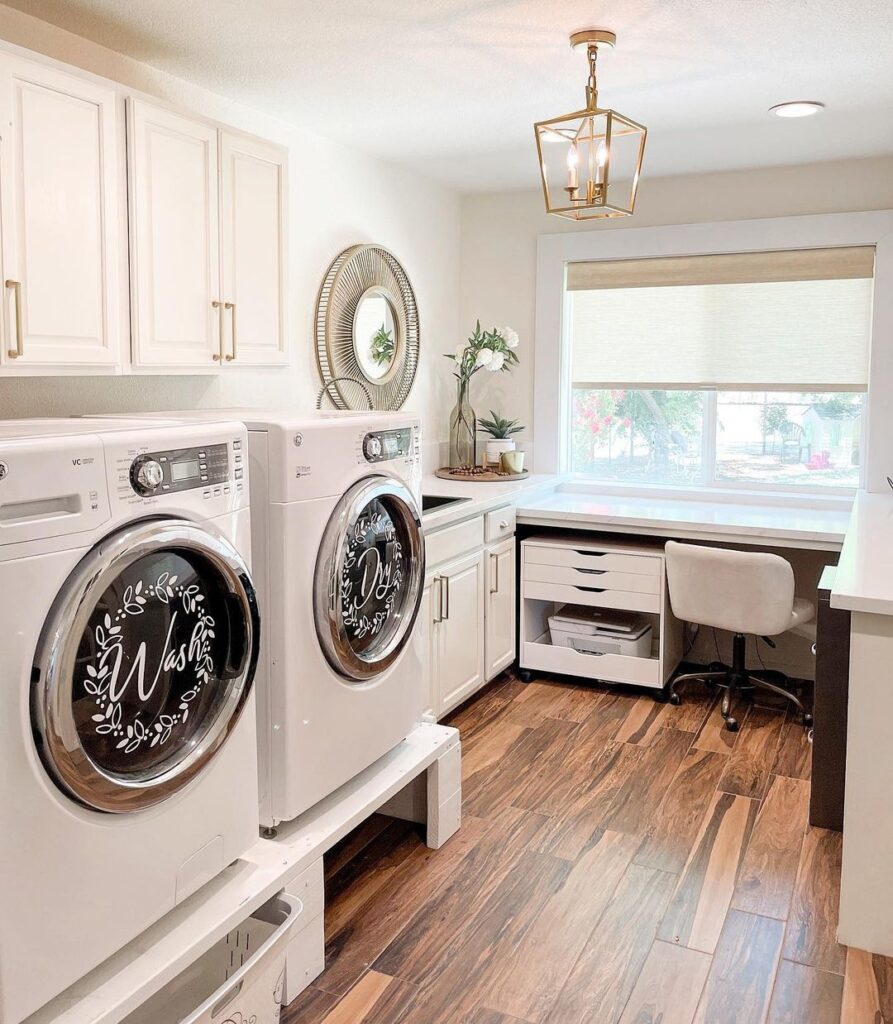 Bright laundry room with desk area and decorative appliances.