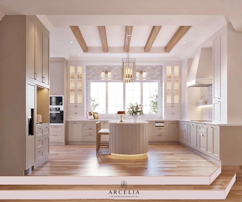 Bright white kitchen with wooden beams and central island.