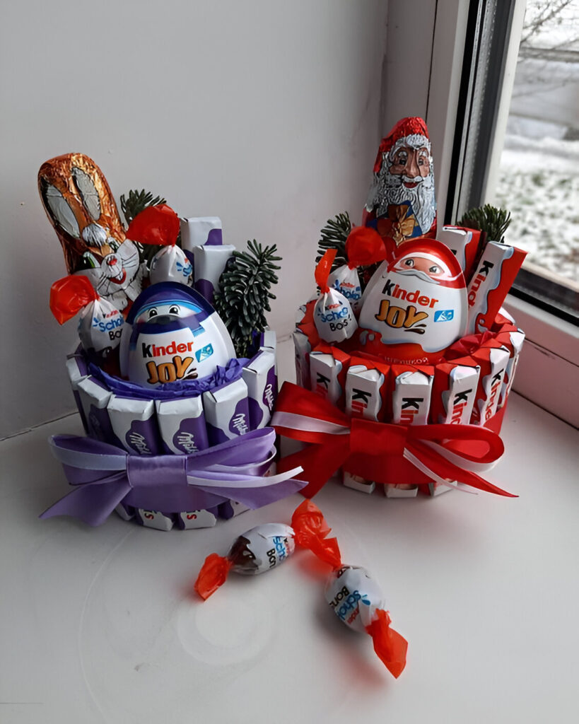 Two Kinder chocolate bouquets on windowsill