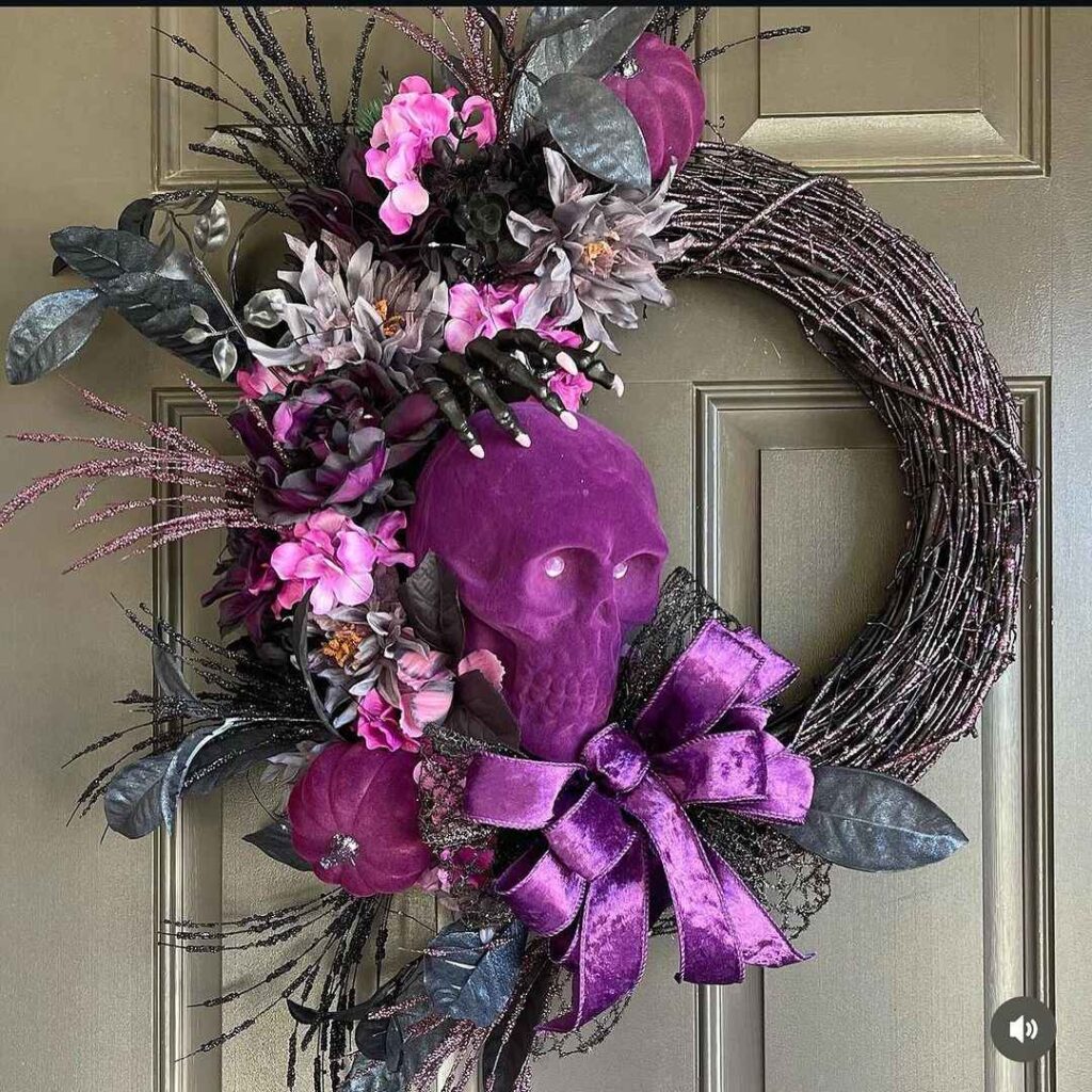 Gothic Halloween wreath with purple skull and flowers.