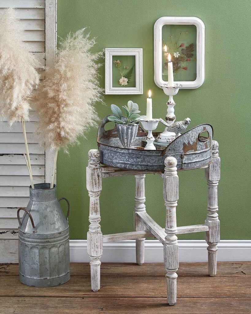 Rustic entryway decor with white table and pampas grass