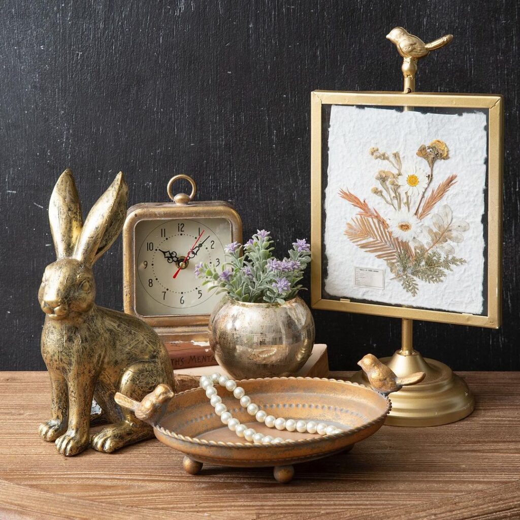 Vintage decor collection with rabbit clock and flowers