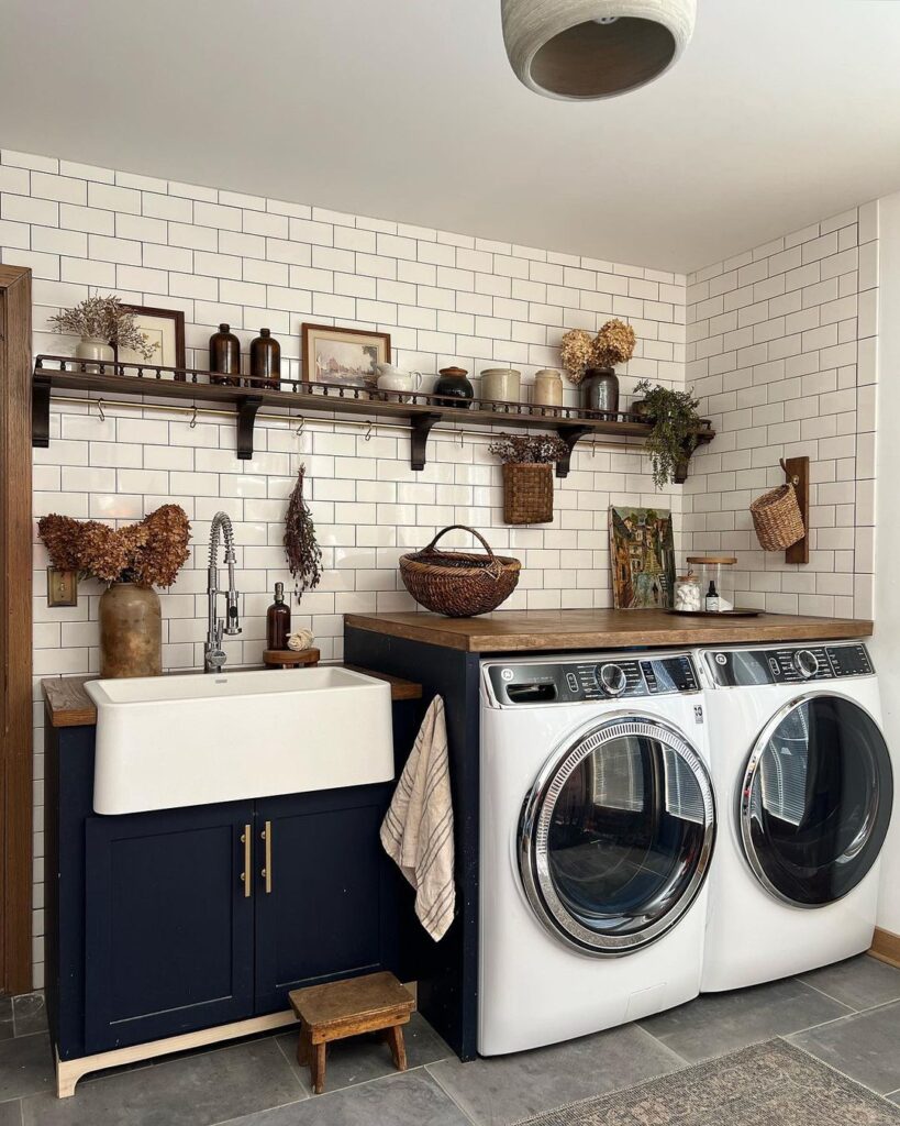 Laundry room with subway tiles farmhouse sink and modern appliances