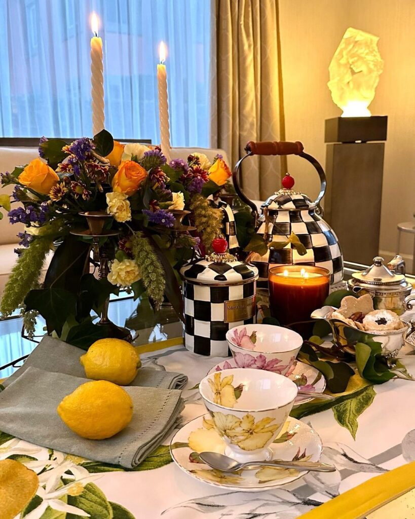 Colorful Thanksgiving table with checkered teapot floral centerpiece