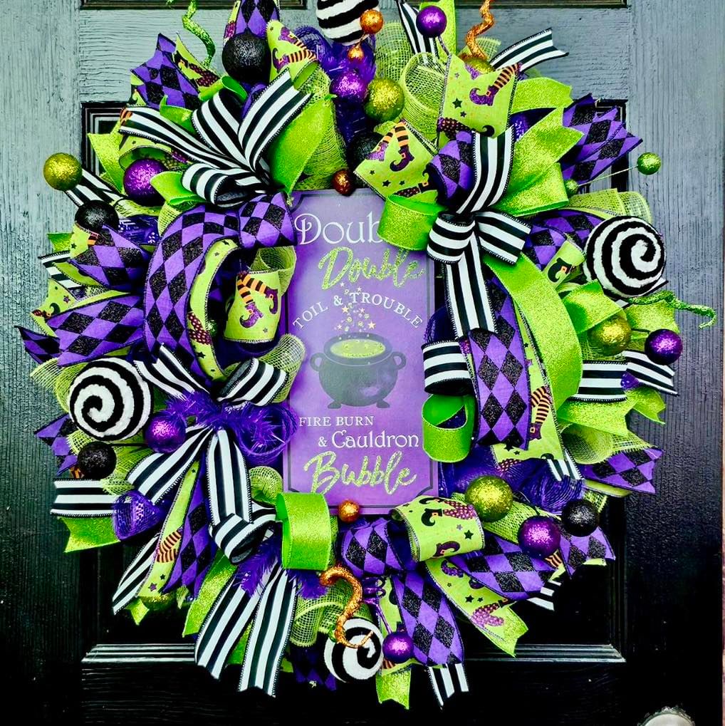 Colorful Halloween wreath with witch theme and cauldron sign.