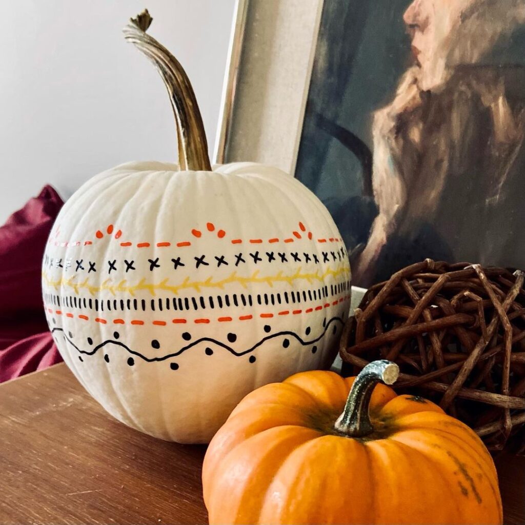 White pumpkin with colorful boho-inspired pattern painting