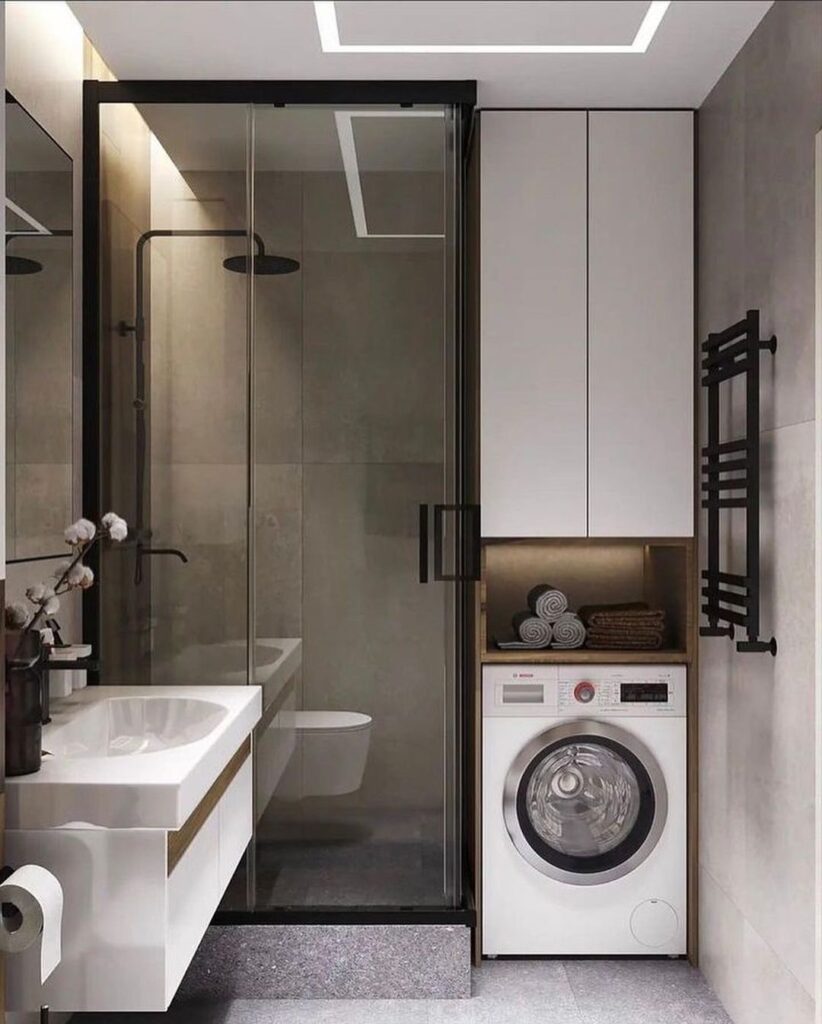 Minimalist bathroom with integrated laundry glass shower and floating vanity