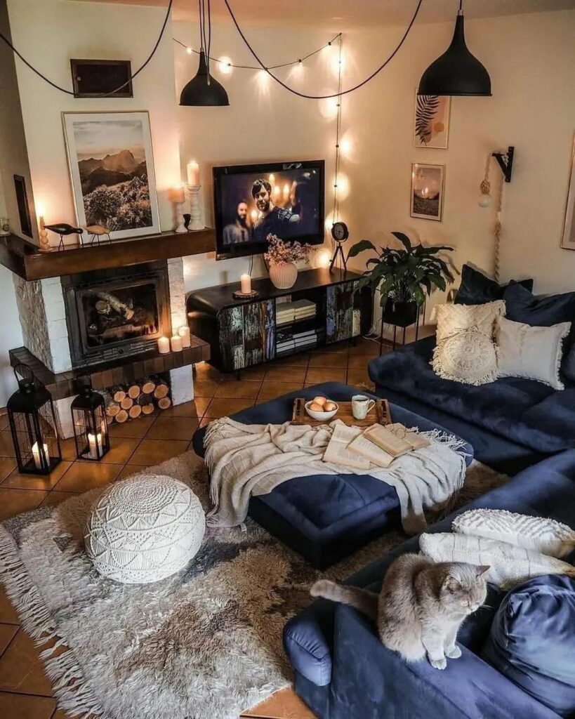 Cozy living room with fireplace string lights and cat