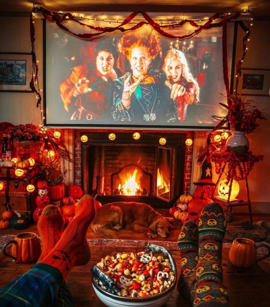 
Halloween-decorated living room with movie projection