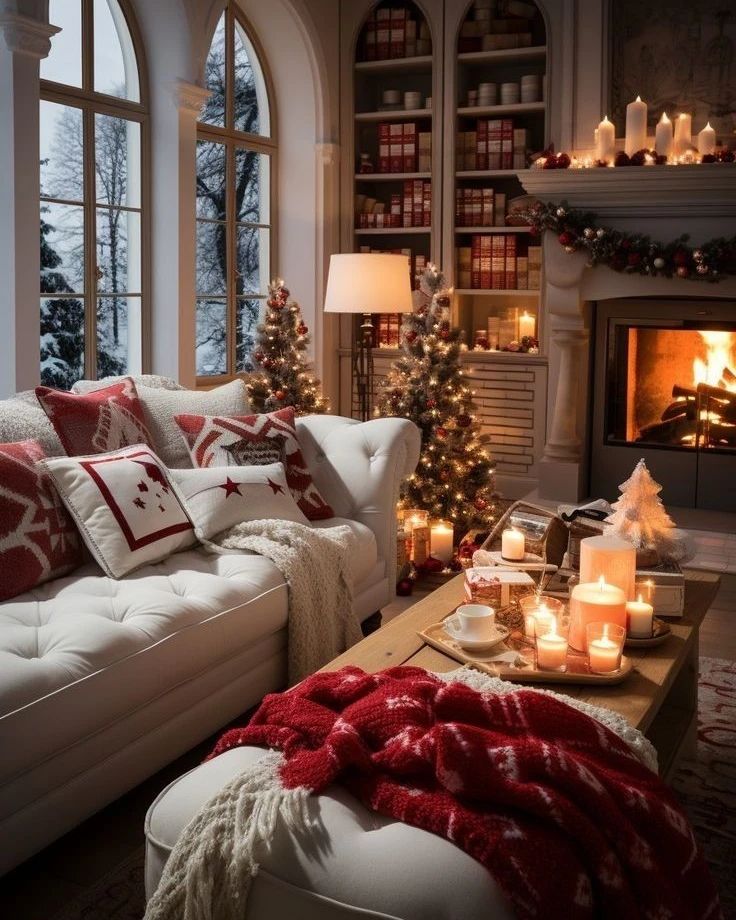 "Snowy winter library with candlelit fireplace and white tufted sofa with red accents"