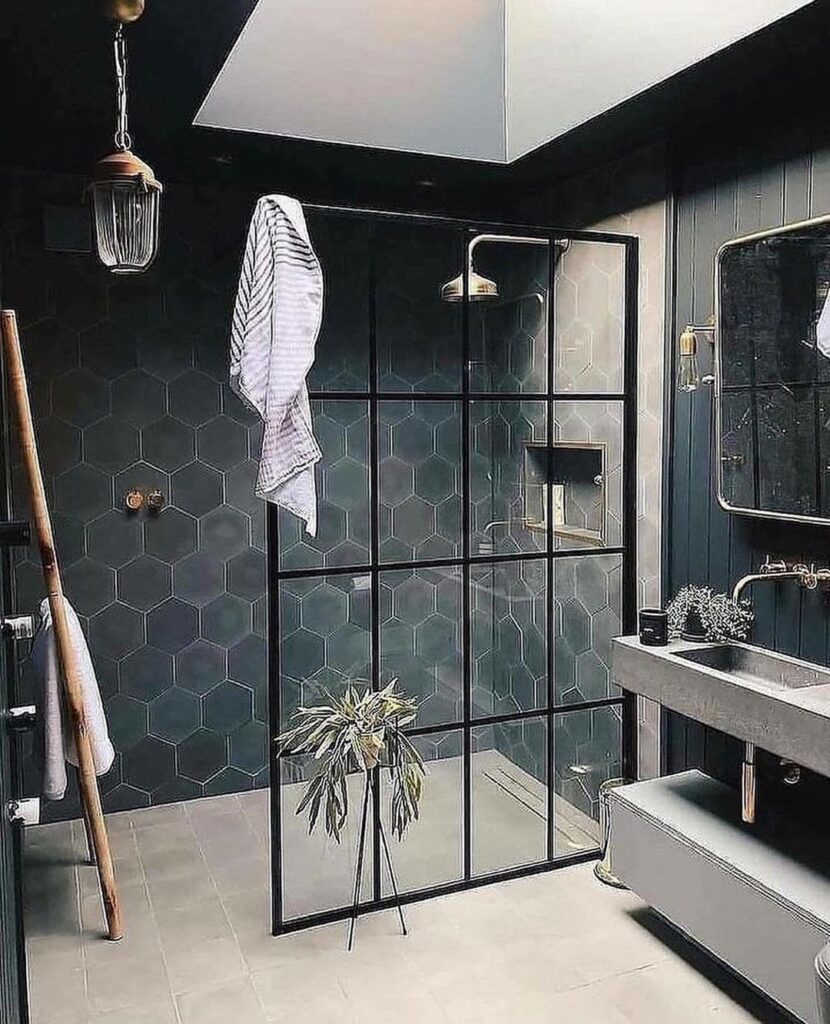 Sleek dark bathroom with industrial touches