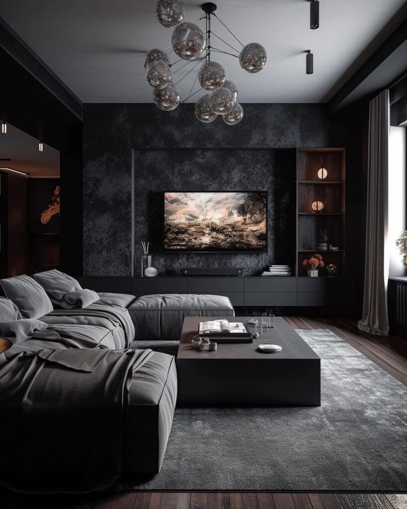 Elegant black living room with glass chandelier.