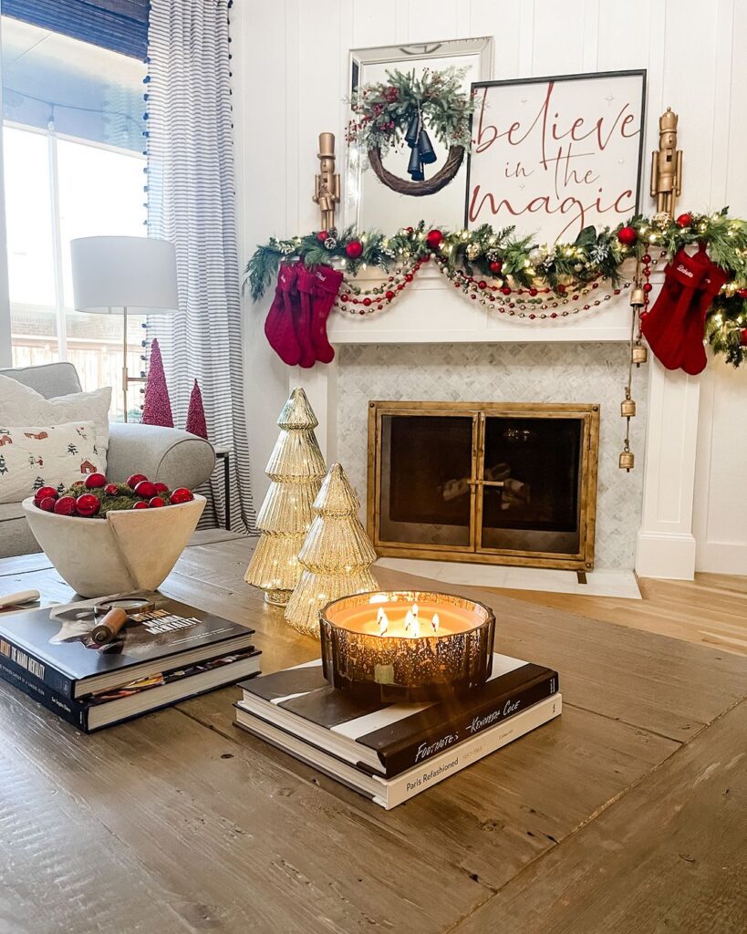 Modern farmhouse Christmas decor with believe sign and mercury glass trees