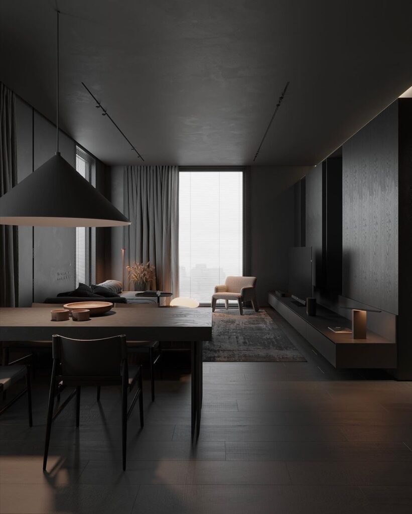 Moody black living room with dining area and large window.