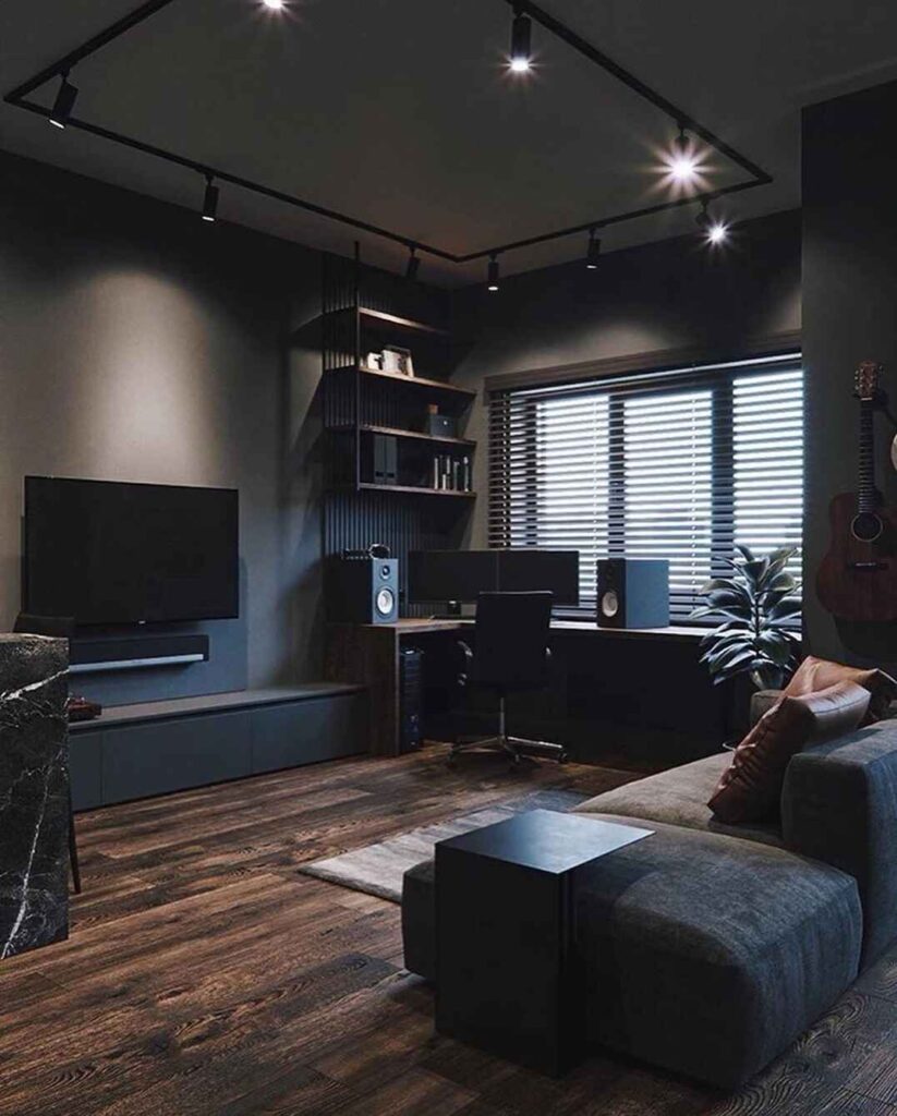 Dark modern living room with workspace TV and sofa