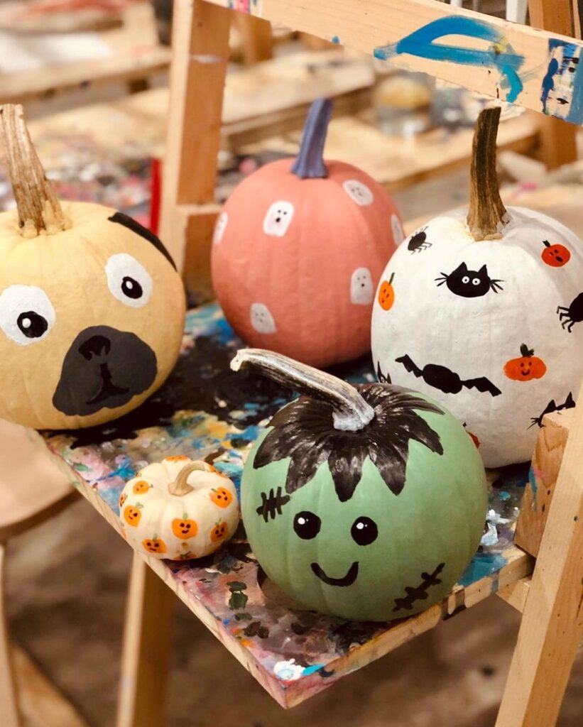 Painted pumpkins with cute monster faces