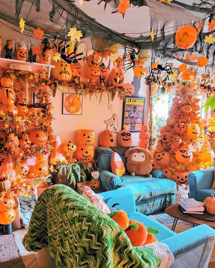 Living room overflowing with pumpkins and Halloween decorations