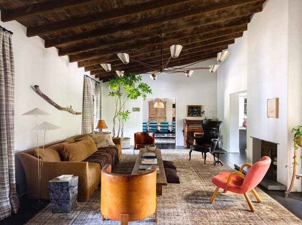 Eclectic mid-century living room with beamed ceiling