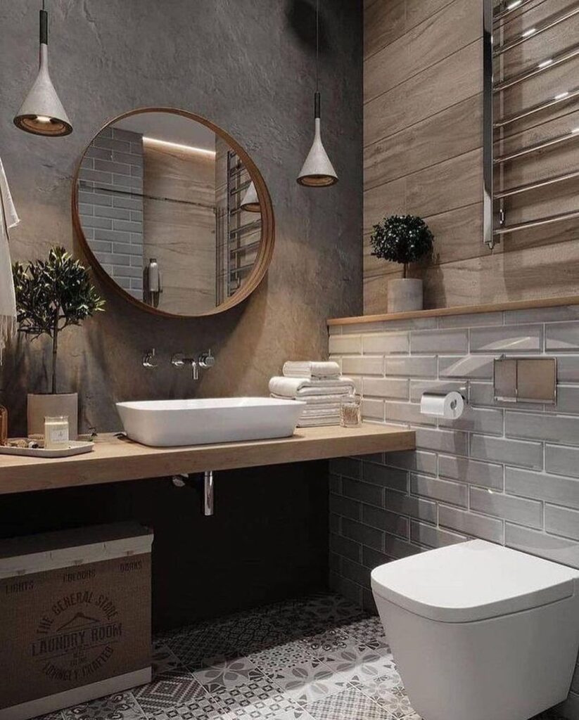 Industrial bathroom with concrete walls, wood accents, and patterned floor tiles.