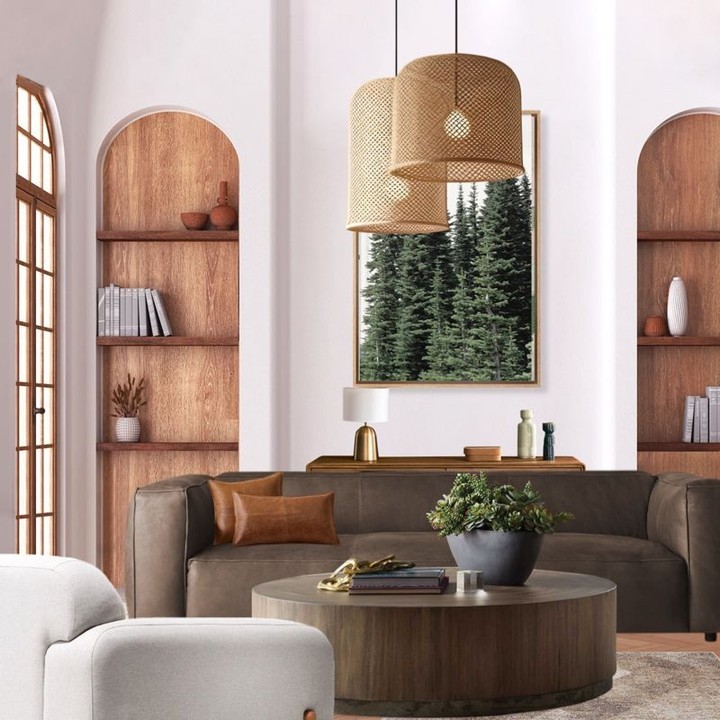 Living room with wooden accents and forest artwork