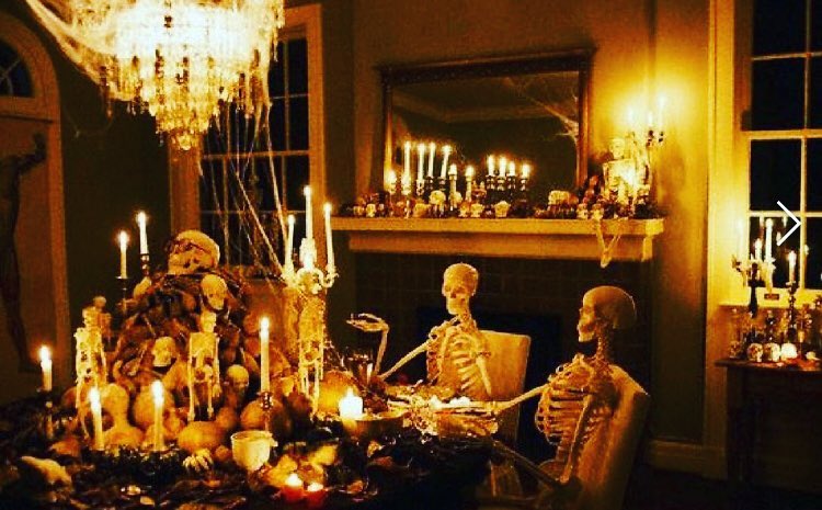 Candlelit Halloween dining room with skeleton guests