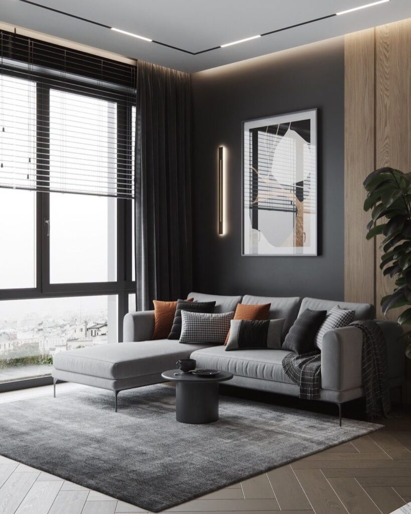 Modern dark living room with city view and gray sofa