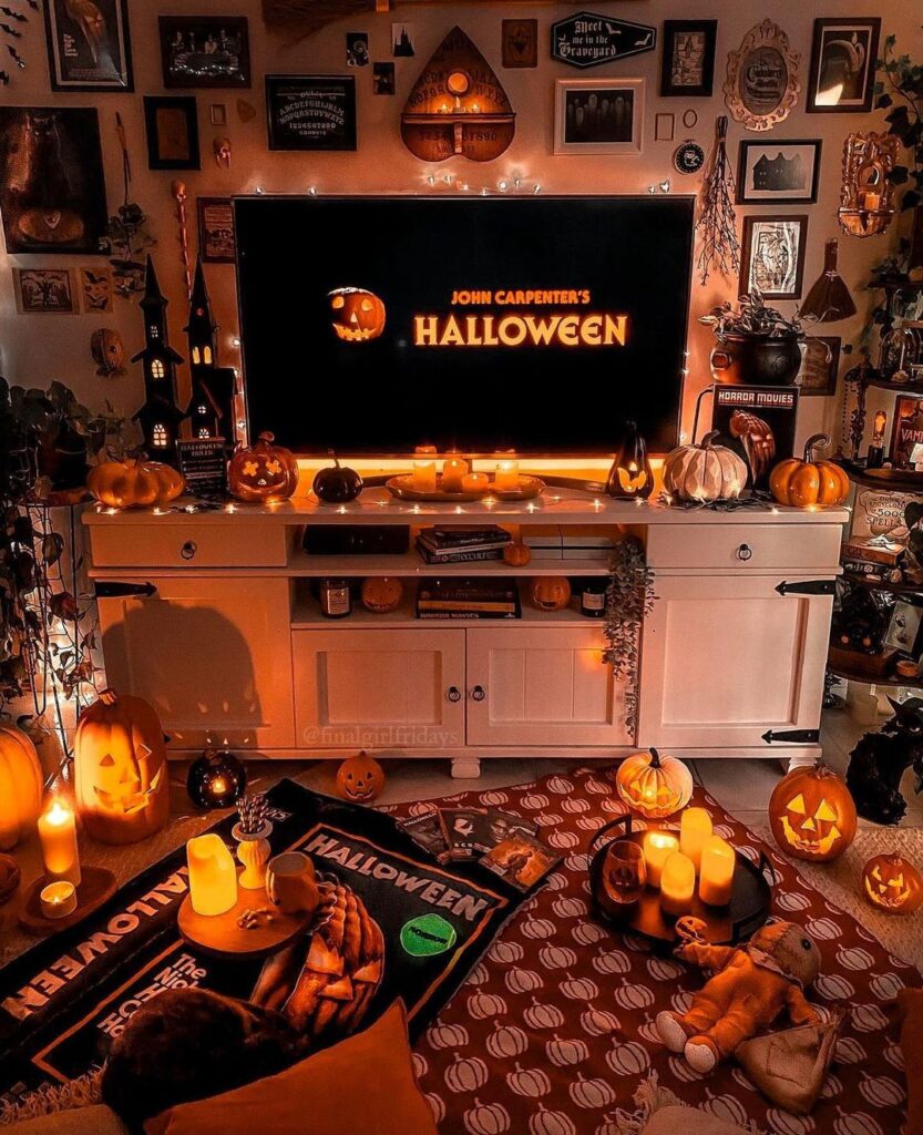 Halloween-themed room with movie setup and spooky decor