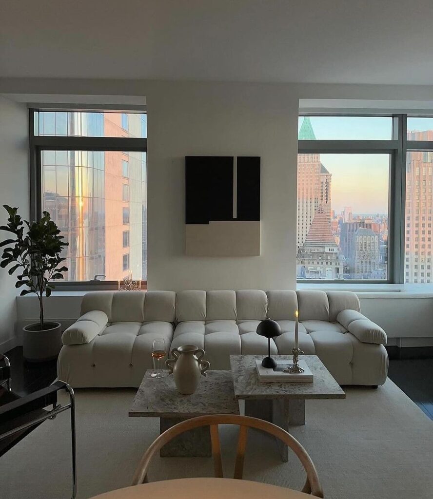 Modern living room with city skyline view