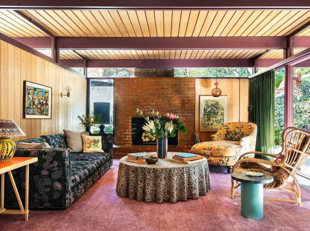 Mid-century living room with colorful furniture and wooden ceiling