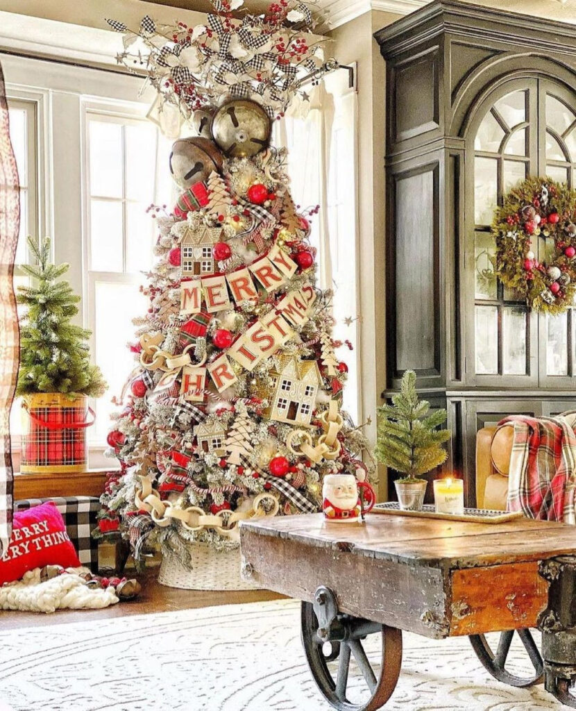  "Flocked Christmas tree with buffalo check decor beside vintage cart"