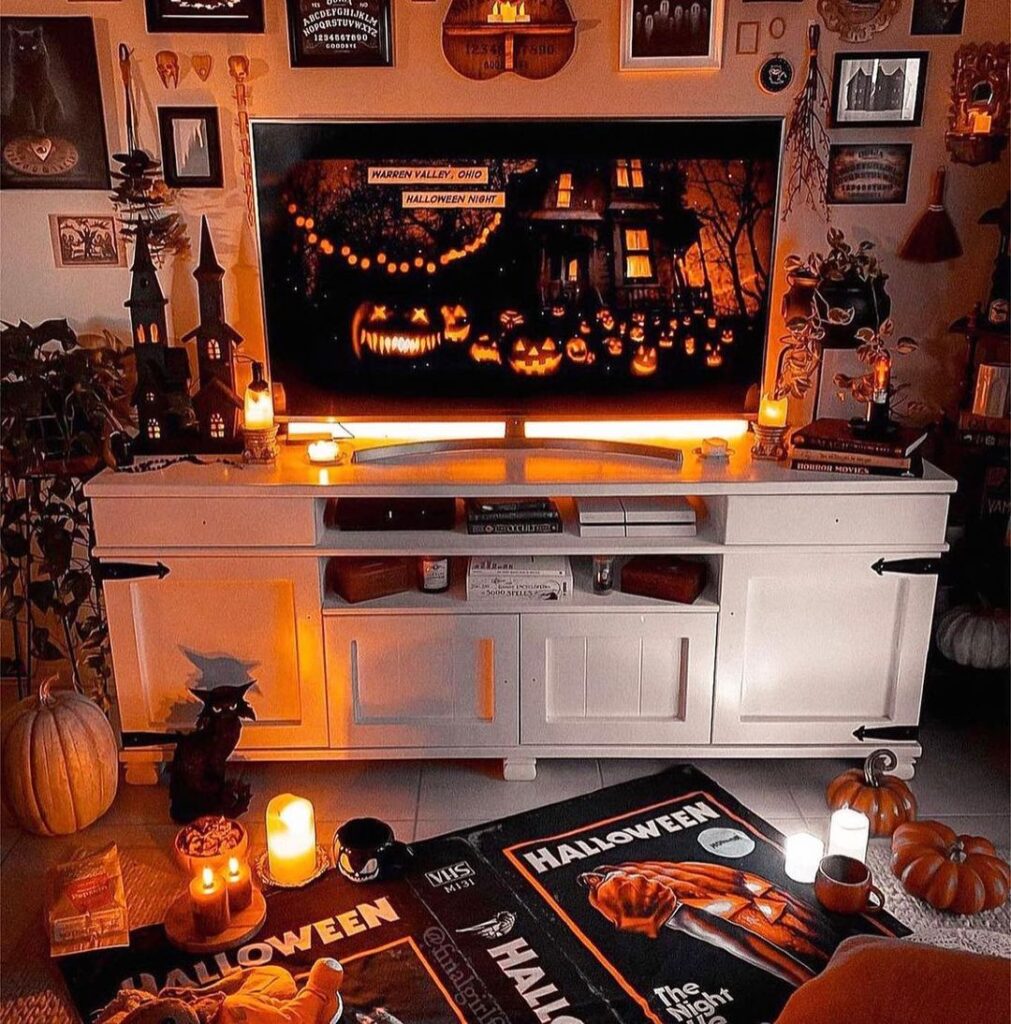 Halloween-themed living room with spooky decor and movie posters