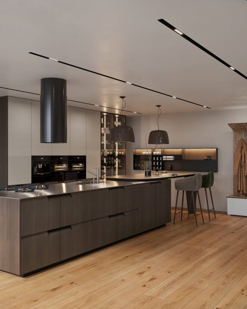 Minimalist kitchen with dark cabinets and metallic accents