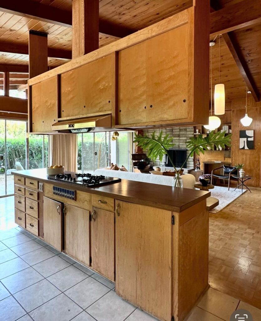  Preserved mid century kitchen with wood panels and beamed ceiling