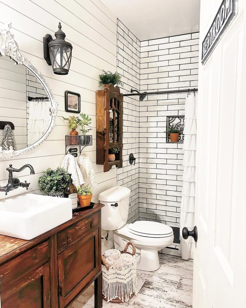 Industrial bathroom with shiplap walls and subway tile shower