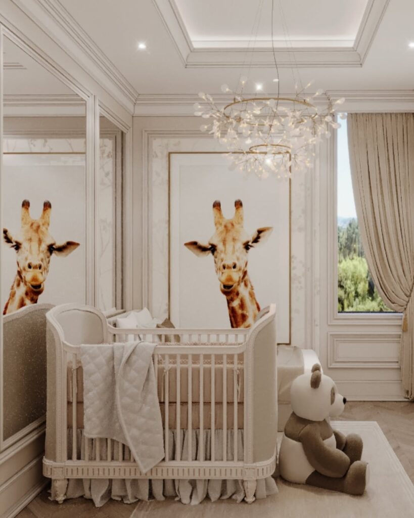 Elegant nursery with giraffe artwork crystal chandelier and white crib