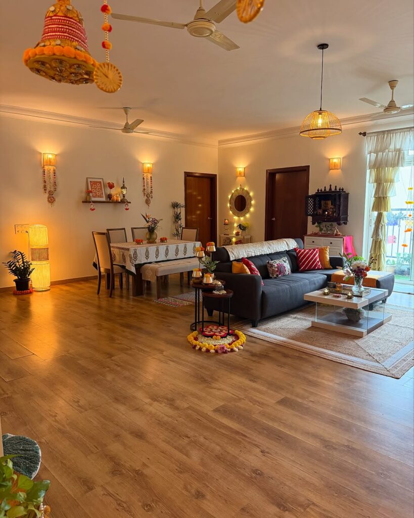 Modern living room with Indian decor elements pendant lights and ethnic textiles