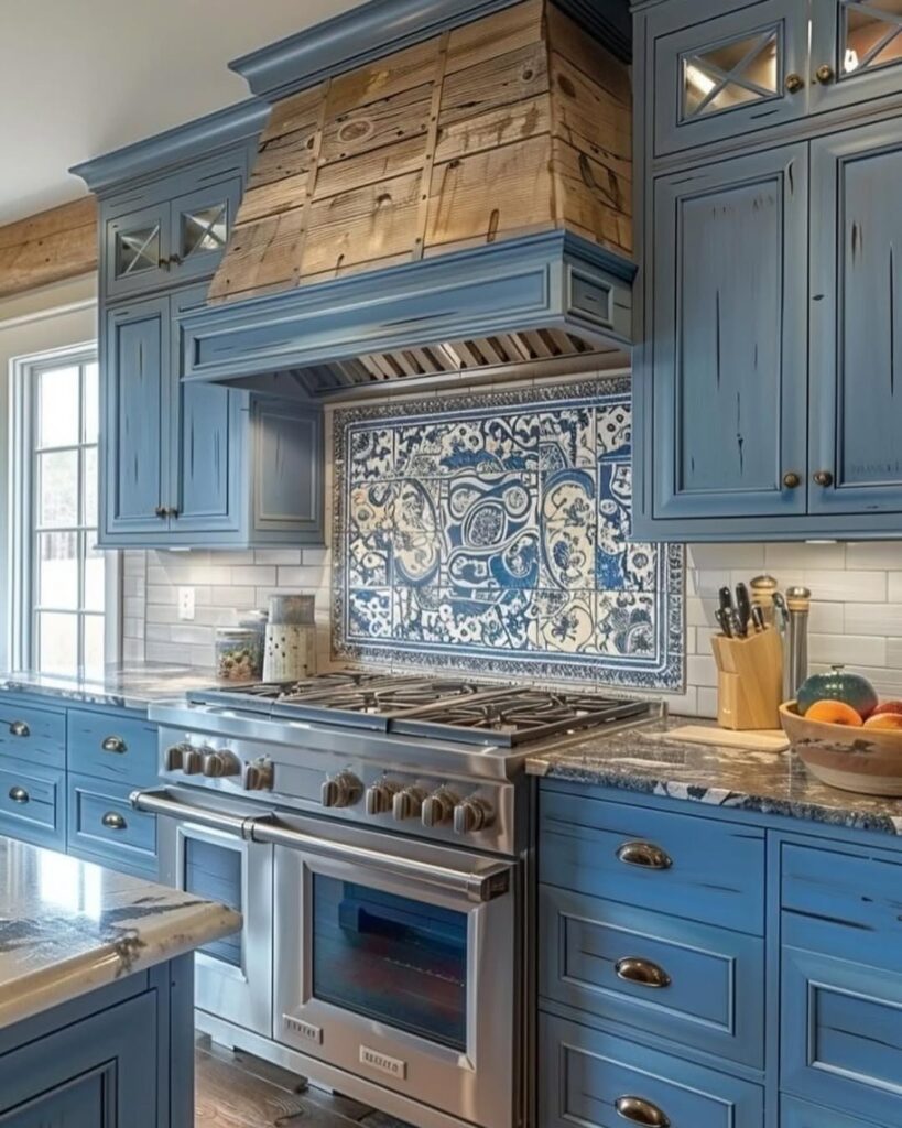 Blue kitchen with delft tile backsplash wooden hood and granite counters