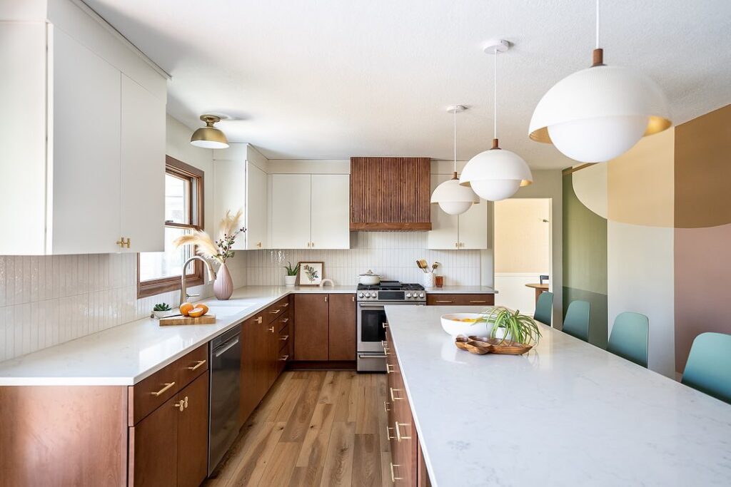 Contemporary kitchen featuring walnut cabinets and white countertops