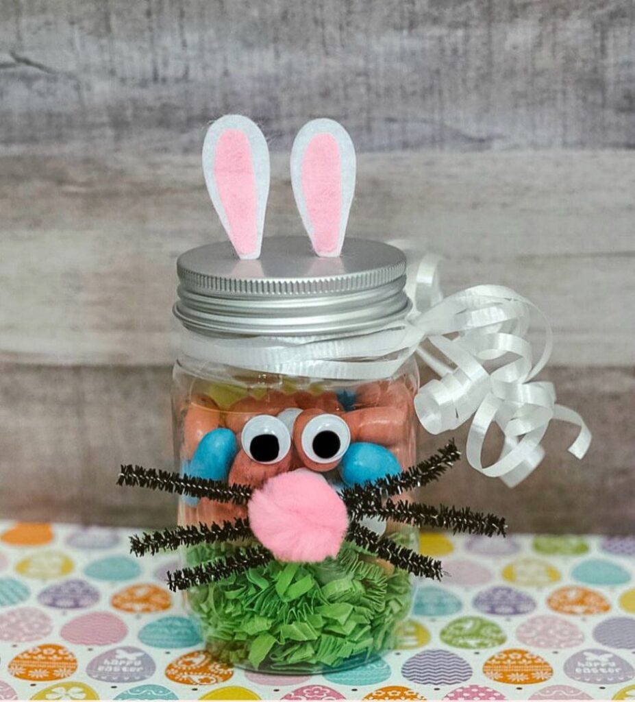 Mason jar decorated as Easter bunny face with candy inside